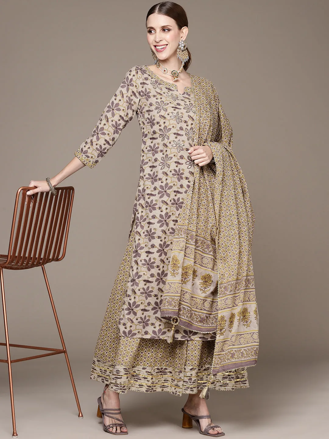 Ishin Women Beige Floral Embroidered Beads and Stones Kurta with Sharara & With Dupatta