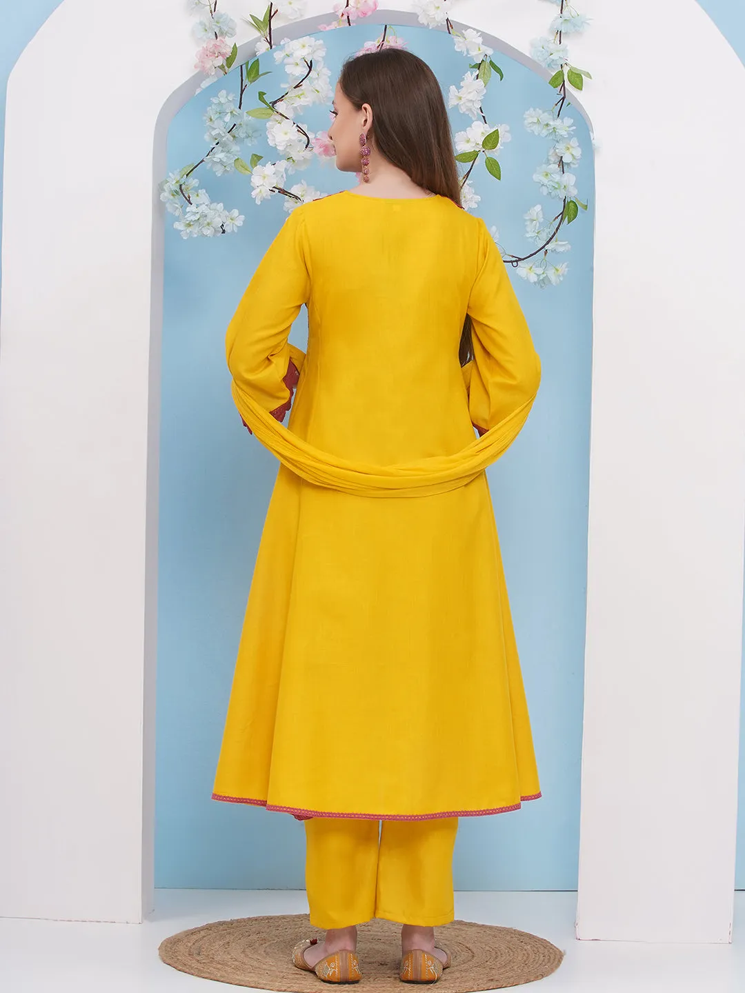 Jashvi Yellow Embroiderd Anarkali Flared Kurta with Palazzos Dupatta.
