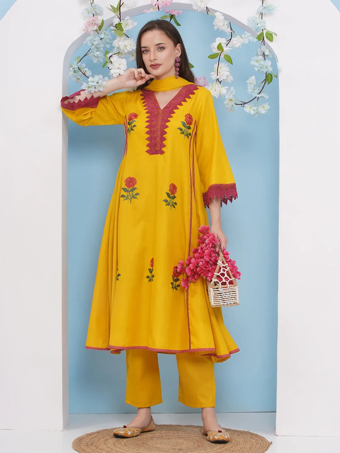 Jashvi Yellow Embroiderd Anarkali Flared Kurta with Palazzos Dupatta.