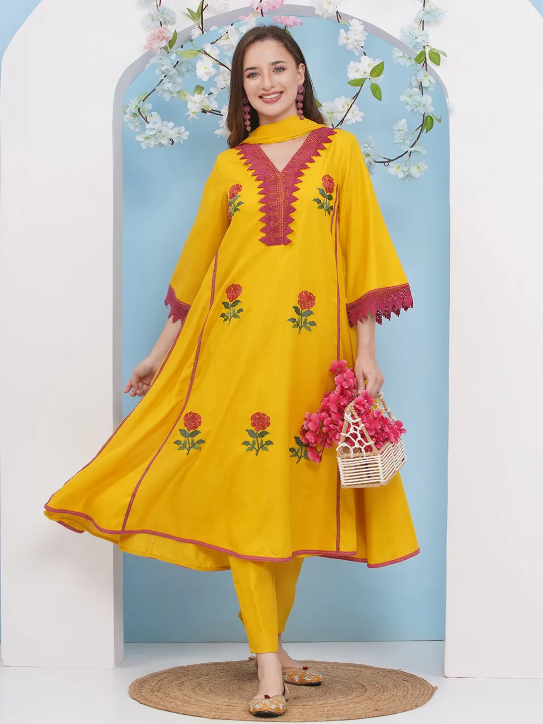 Jashvi Yellow Embroiderd Anarkali Flared Kurta with Palazzos Dupatta.