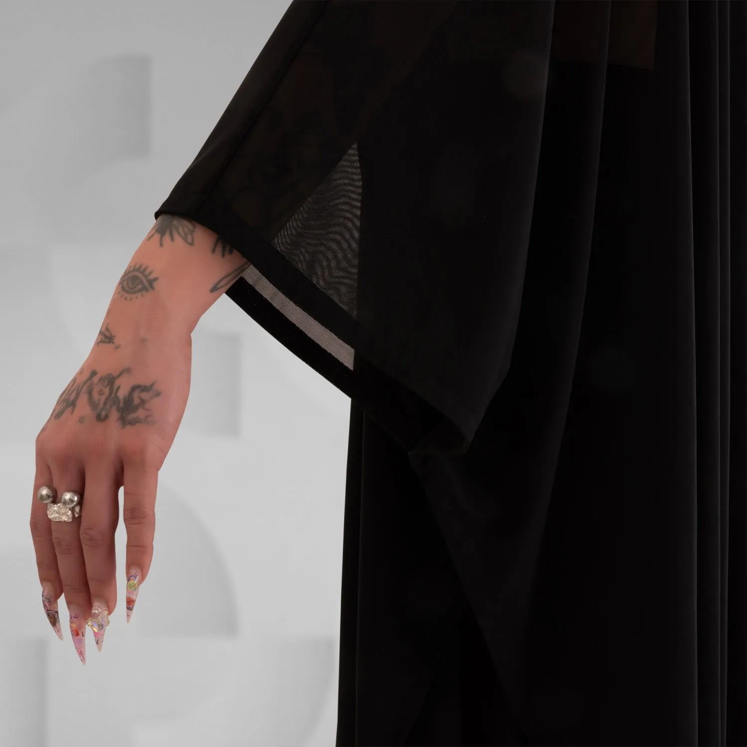 Sheer Statement Poncho
